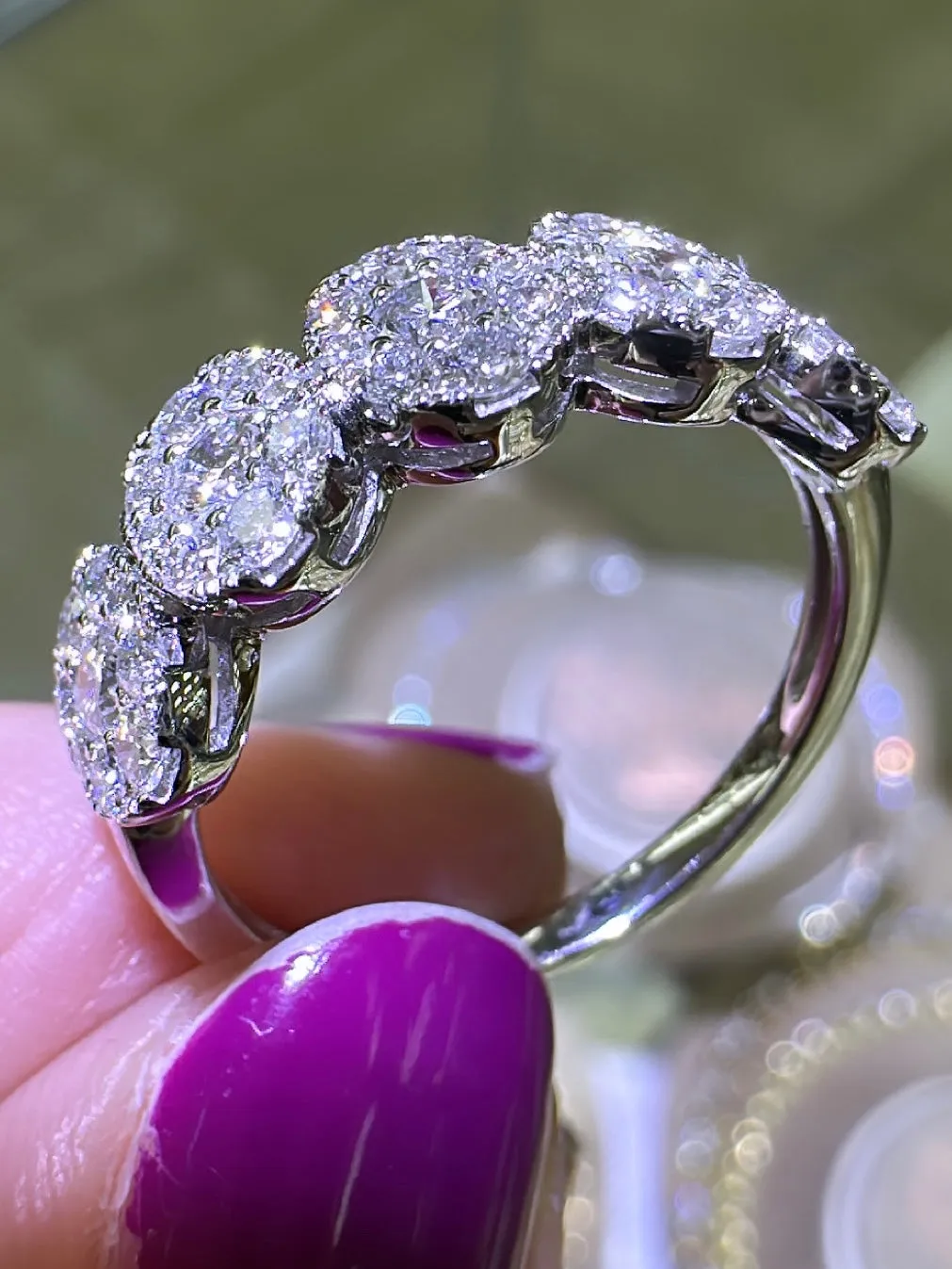 0.99CT T.W. Ladies Oval Half Eternity Invisible Set Diamond Ring