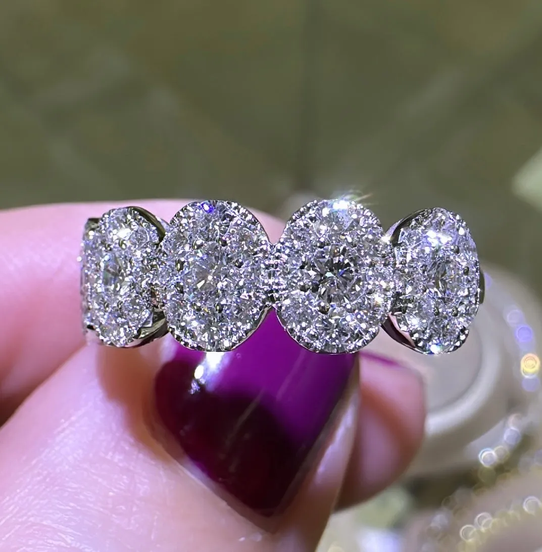 0.99CT T.W. Ladies Oval Half Eternity Invisible Set Diamond Ring