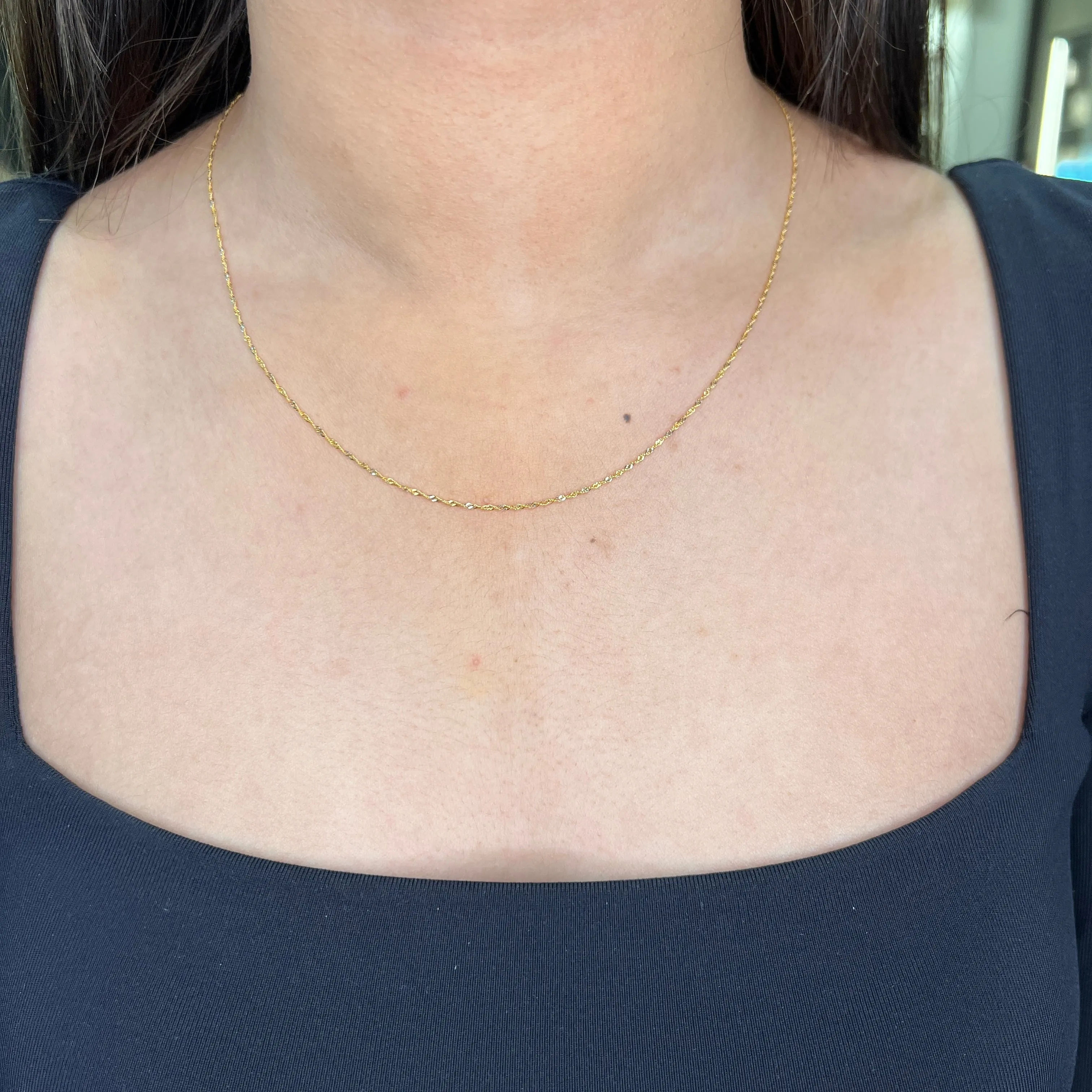 10K Yellow and White Gold (0.9mm) Singapore Chain (16" - 22")