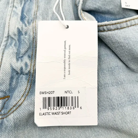 FRAME Light Wash Elastic Waist Denim Shorts in Natoma Clean