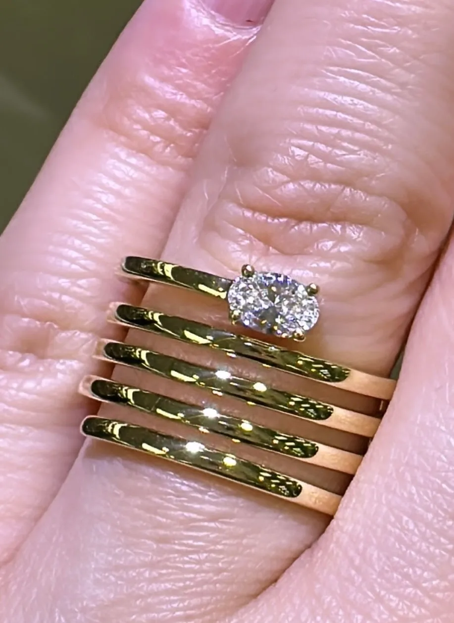 Oval 0.30carat Diamond with Five Row Diamond Spiral Right Hand Cocktail Ring