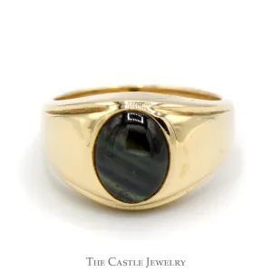 Oval Cabochon Black Star Sapphire Ring with Polished Sides in 14k Yellow Gold